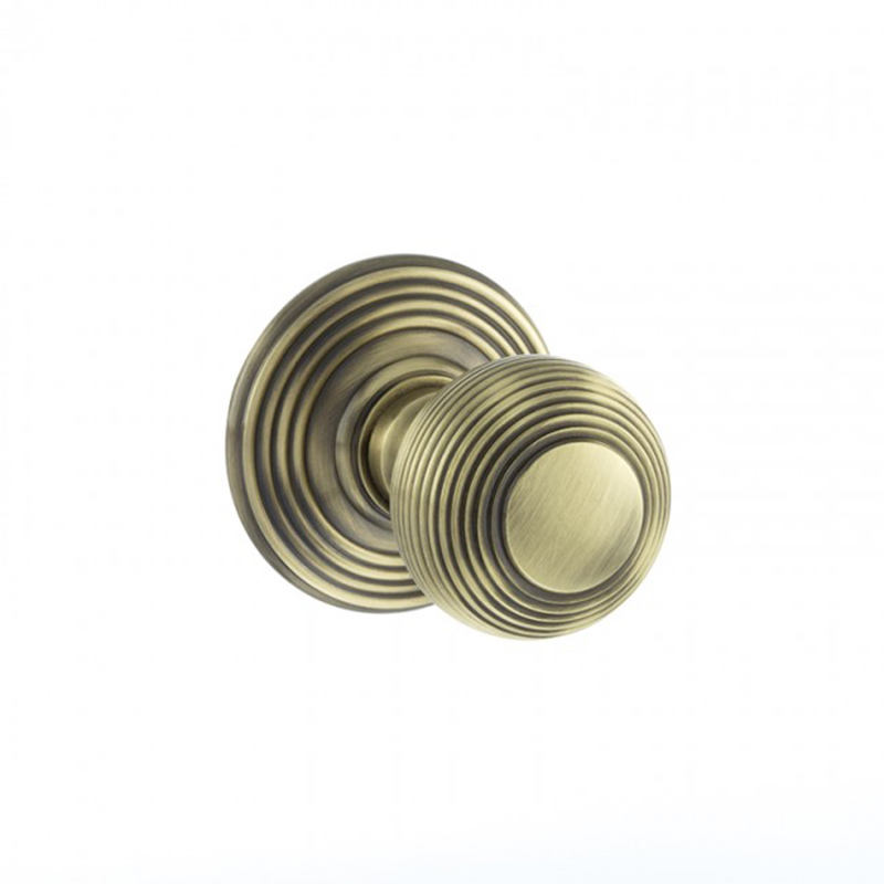 Ripon Round Reeded Mortice Knob - Antique Brass